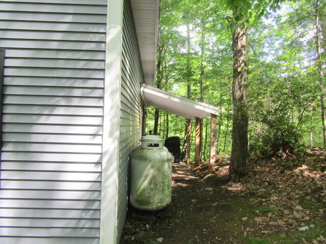 52 Andrews Road Sumner, ME 04292 - Photo 44 of 51 lean to on side of home