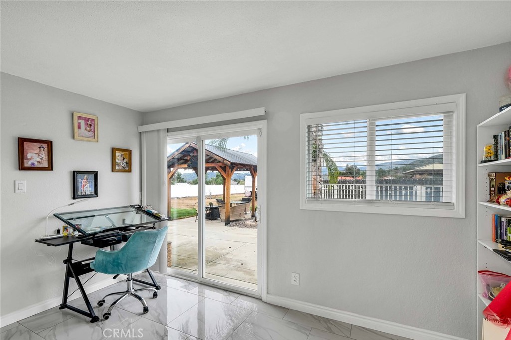 35716 Wildwood Canyon Road Yucaipa, CA 92399 - Photo 35 of 57 a workspace with furniture and a window