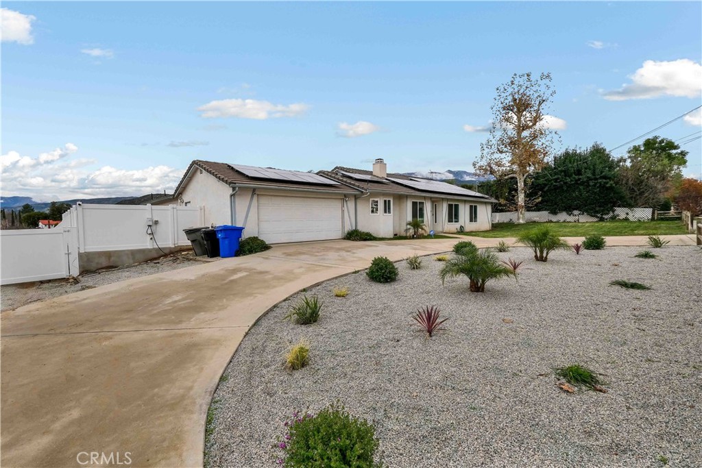 35716 Wildwood Canyon Road Yucaipa, CA 92399 - Photo 4 of 57 a view of a house with a yard