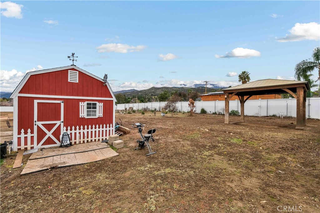 35716 Wildwood Canyon Road Yucaipa, CA 92399 - Photo 48 of 57 a front view of a house with a yard