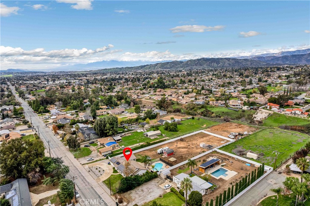 35716 Wildwood Canyon Road Yucaipa, CA 92399 - Photo 51 of 57 an aerial view of residential houses with outdoor space