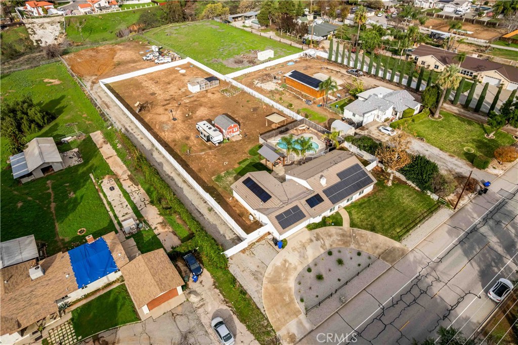 35716 Wildwood Canyon Road Yucaipa, CA 92399 - Photo 56 of 57 an aerial view of a tennis ground and a lots of residential buildings