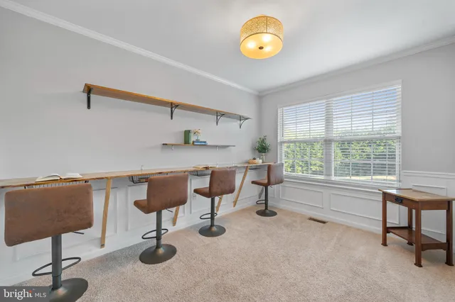 a kitchen with a stove and a microwave