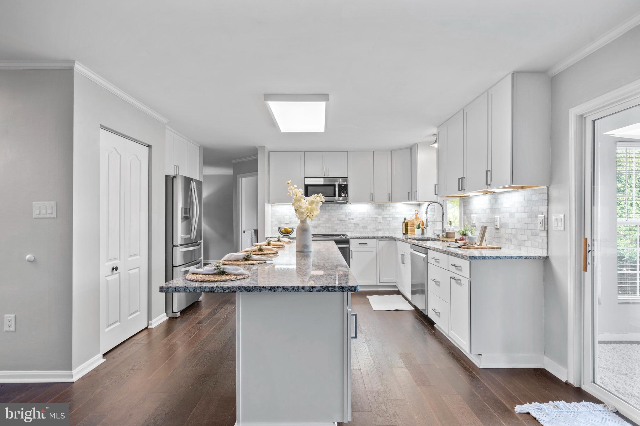 3446 Chaneyville Road Owings, MD 20736 - Photo 24 of 74 a kitchen with refrigerator and cabinets