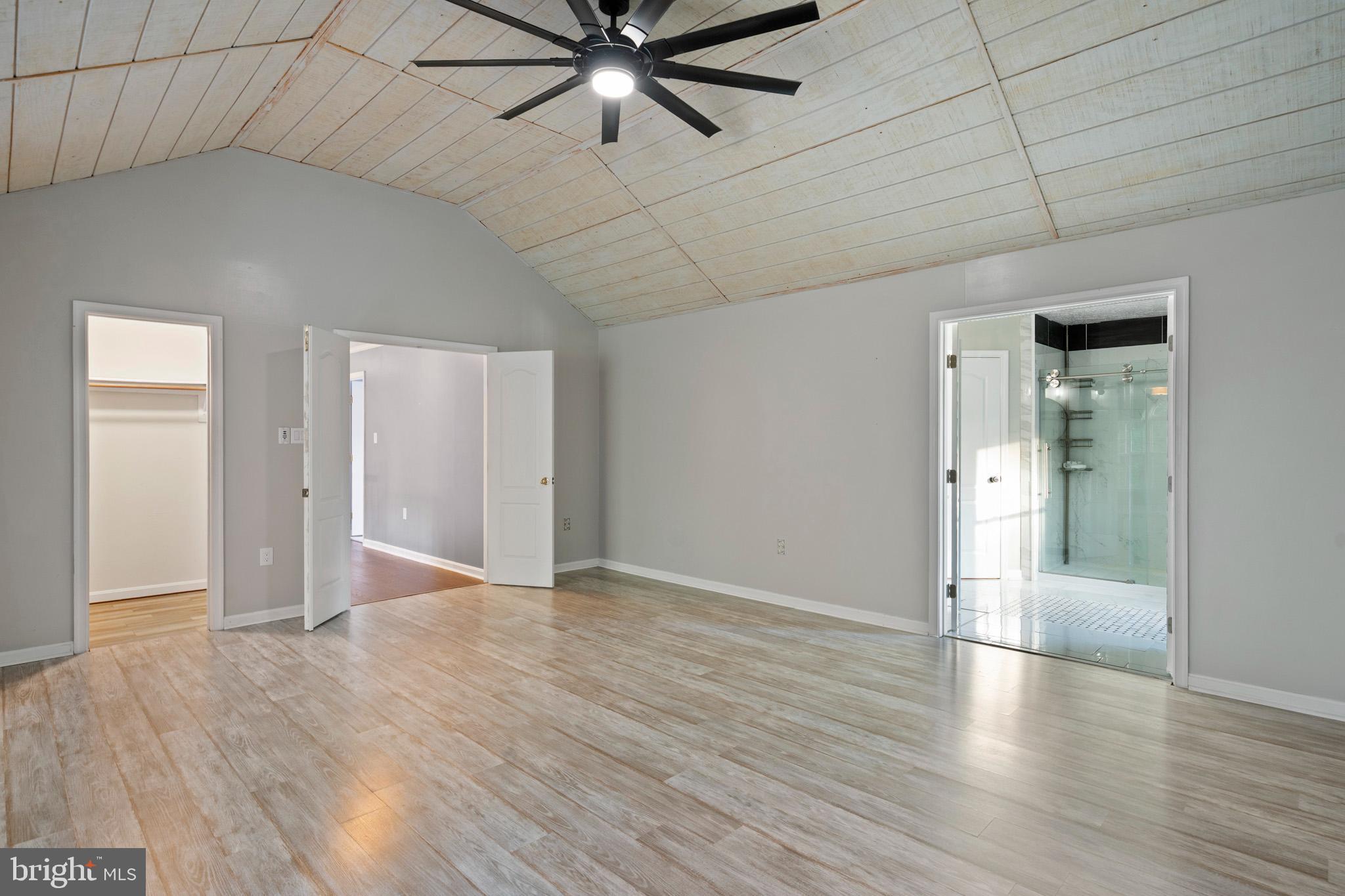 3446 Chaneyville Road Owings, MD 20736 - Photo 35 of 74 wooden floor in an empty room with a window