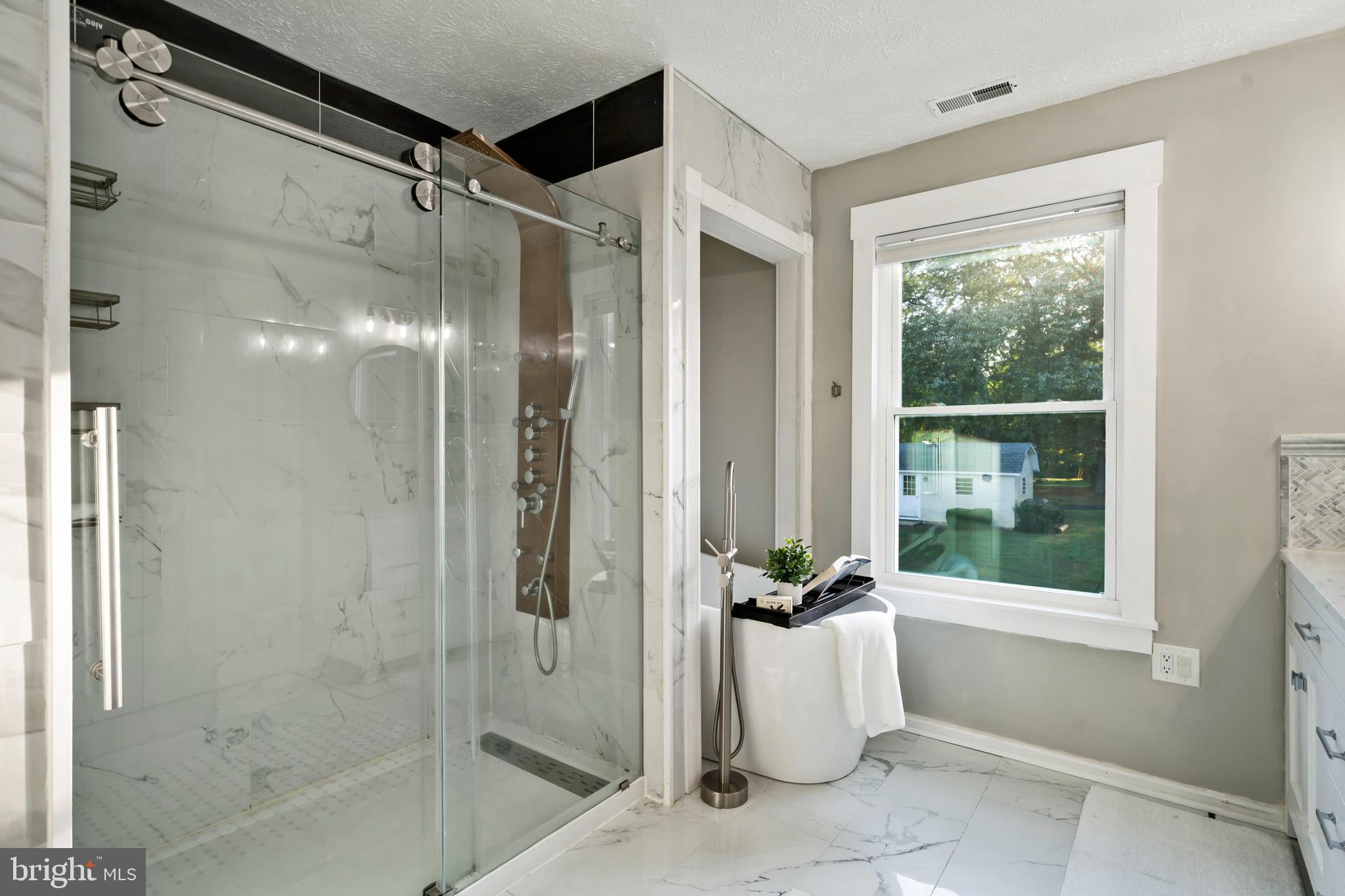 3446 Chaneyville Road Owings, MD 20736 - Photo 36 of 74 a bathroom with a shower and a tub