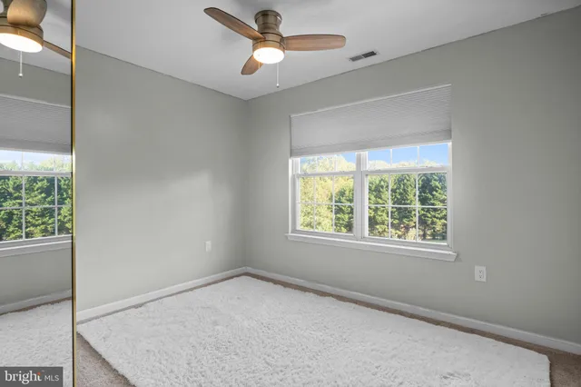 a view of a house with a big yard