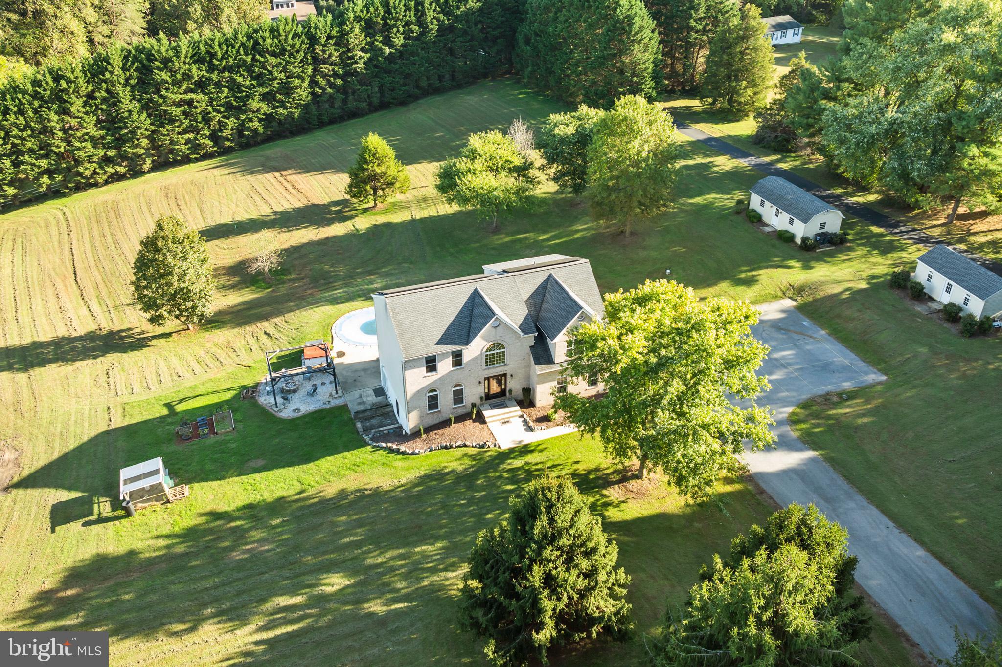 3446 Chaneyville Road Owings, MD 20736 - Photo 5 of 74 a view of a lake with a houses