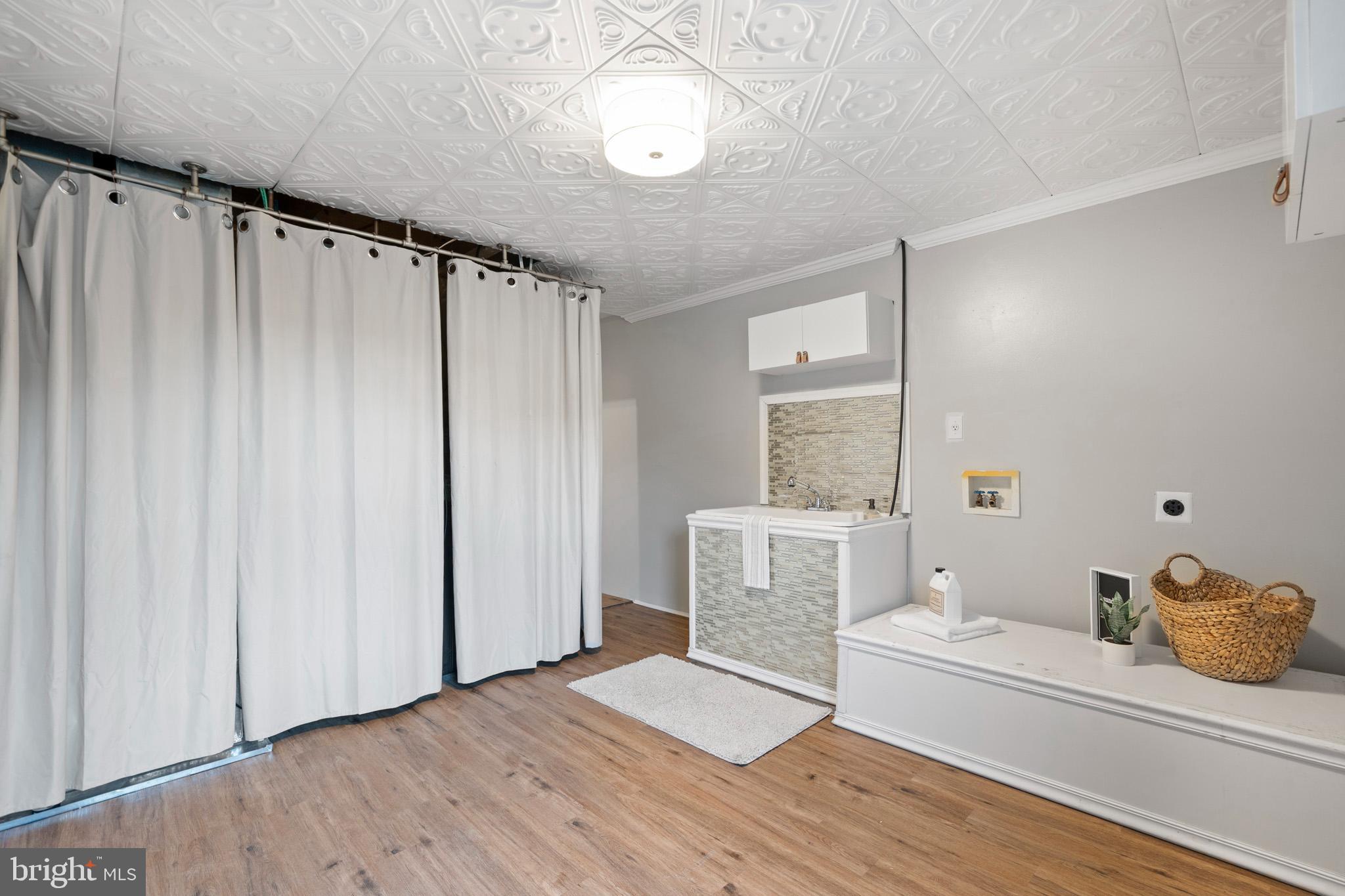 3446 Chaneyville Road Owings, MD 20736 - Photo 61 of 74 a view of a bedroom with wooden floor and windows
