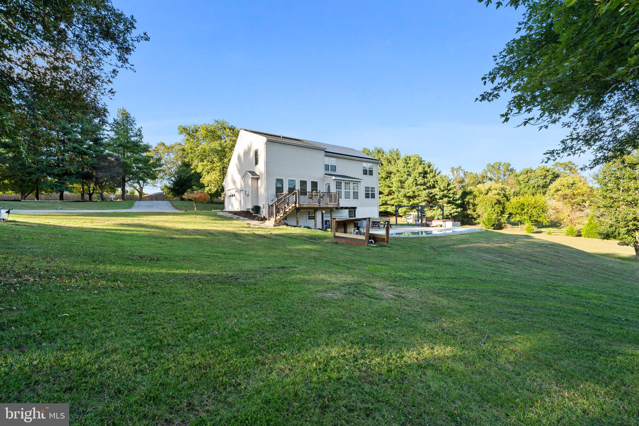 3446 Chaneyville Road Owings, MD 20736 - Photo 68 of 74 a view of a house with a big yard