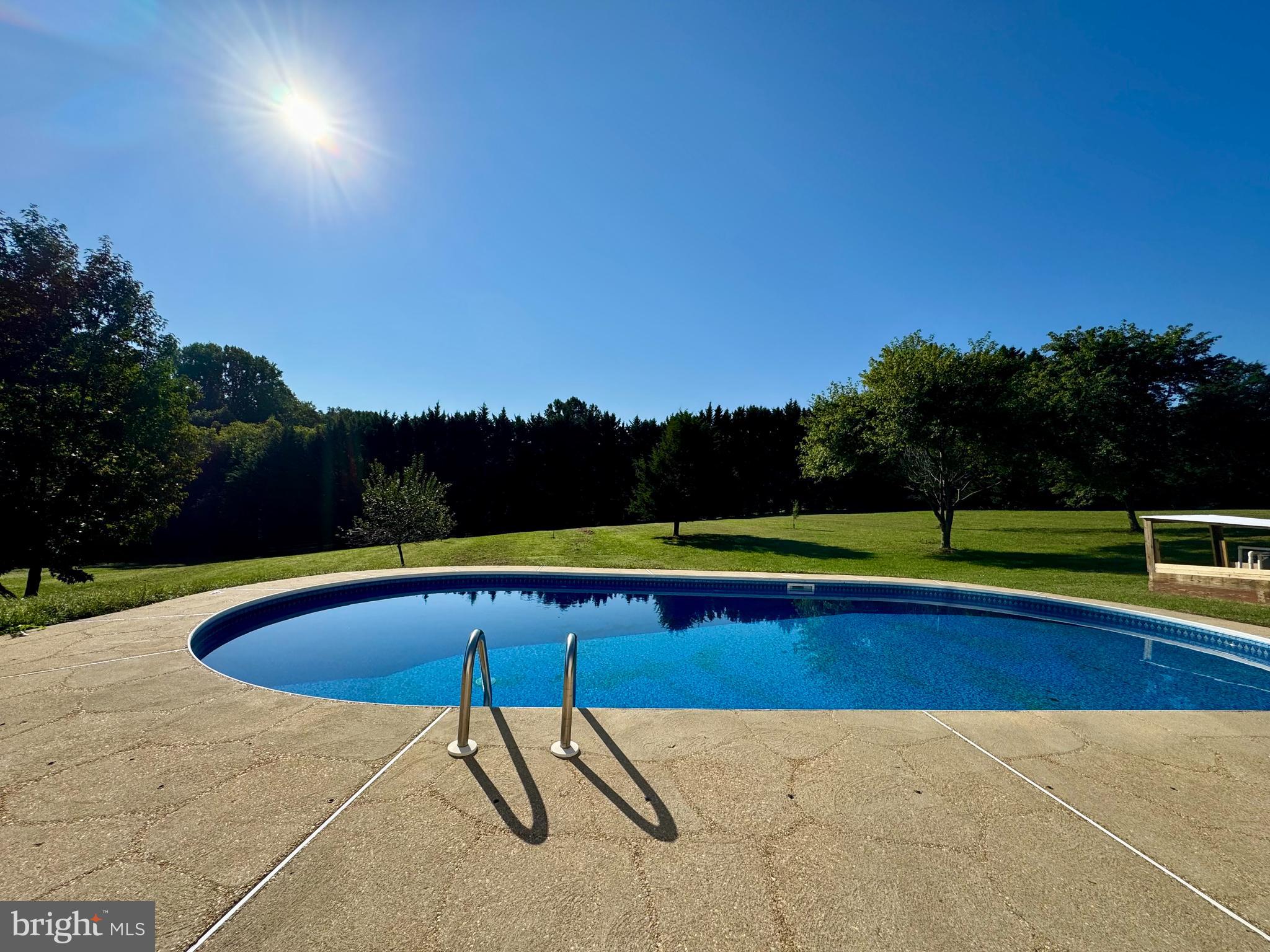 3446 Chaneyville Road Owings, MD 20736 - Photo 73 of 74 a view of swimming pool and a yard