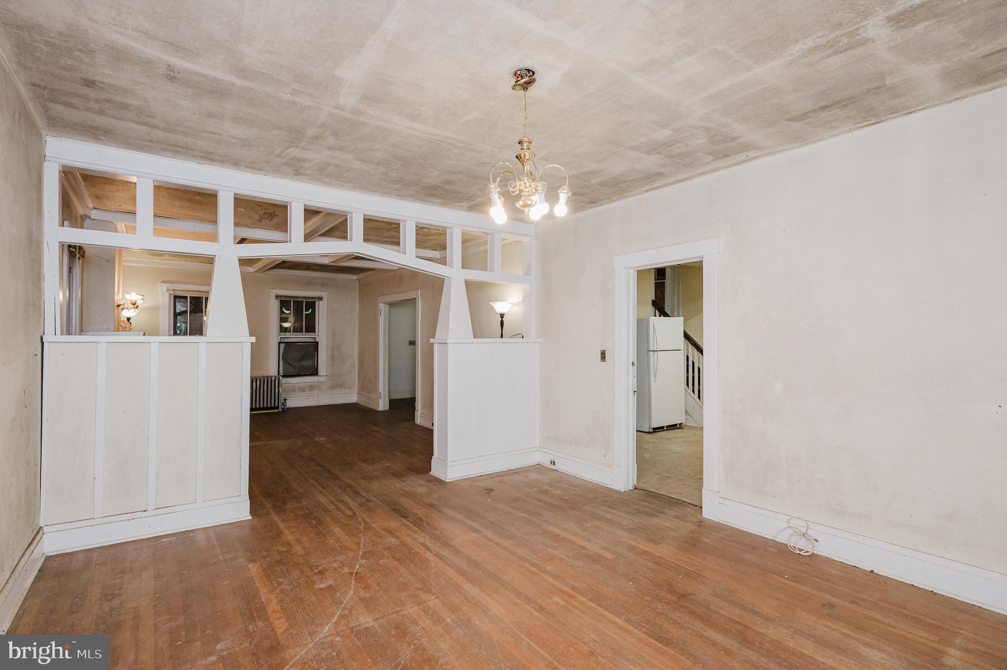 103 Sherwood Road Cockeysville, MD 21030 - Photo 11 of 59 a view of a big room with windows and chandelier