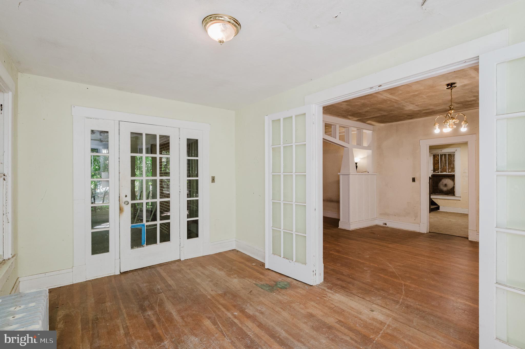 103 Sherwood Road Cockeysville, MD 21030 - Photo 21 of 59 a view of empty room with wooden floor and windows