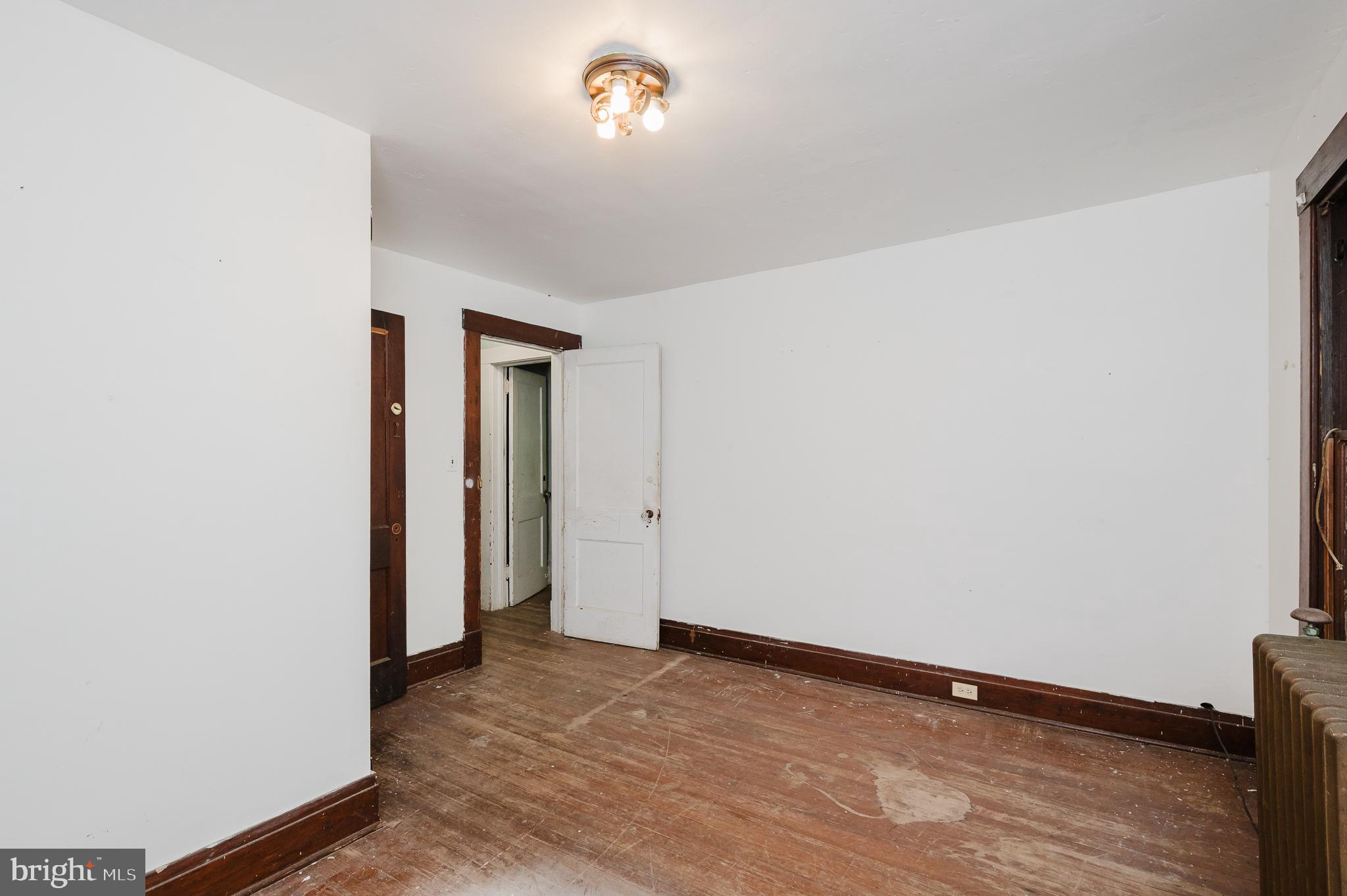 103 Sherwood Road Cockeysville, MD 21030 - Photo 37 of 59 a view of an empty room with wooden floor
