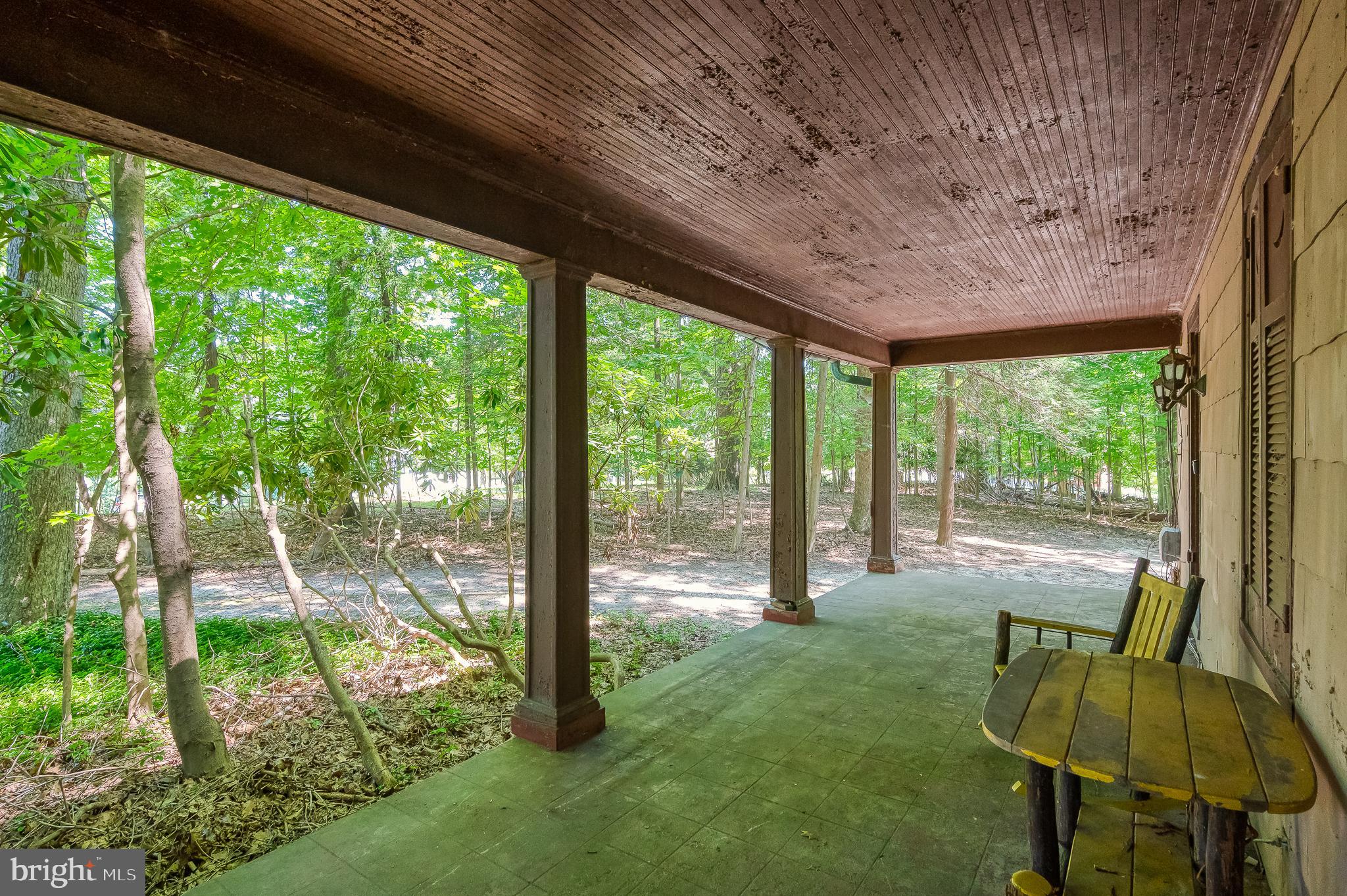 103 Sherwood Road Cockeysville, MD 21030 - Photo 50 of 59 a backyard of a house with a fountain table and chairs