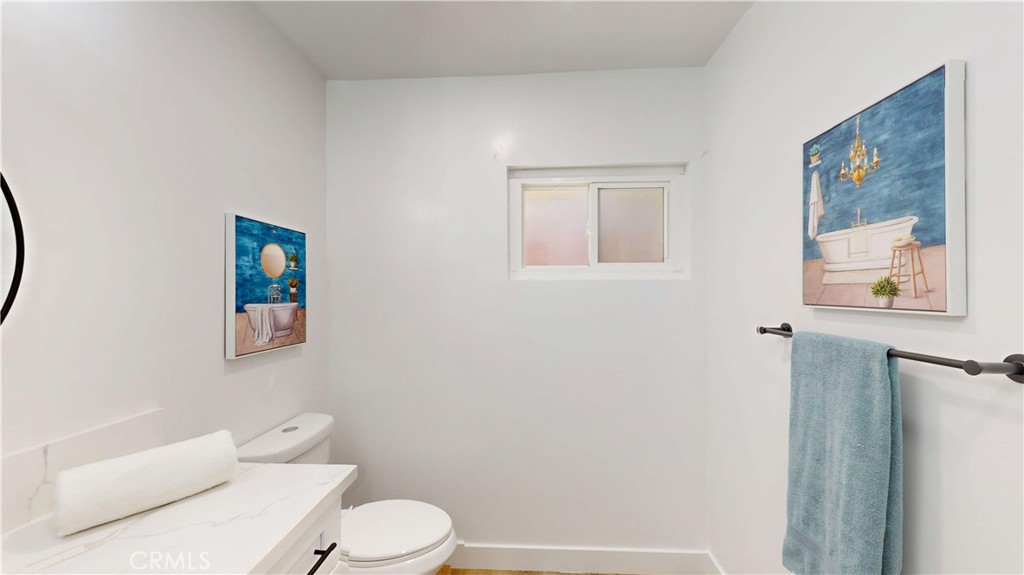 1354 Shadow Fullerton, CA 92831 - Photo 25 of 30 a white toilet sitting next to a bathroom sink and tub