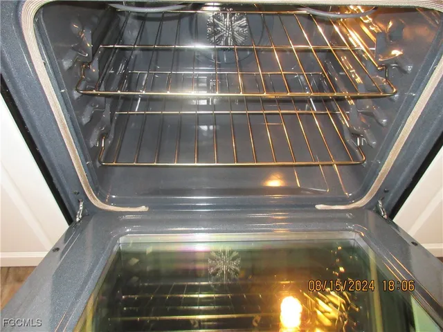 a room with a window and wooden floor