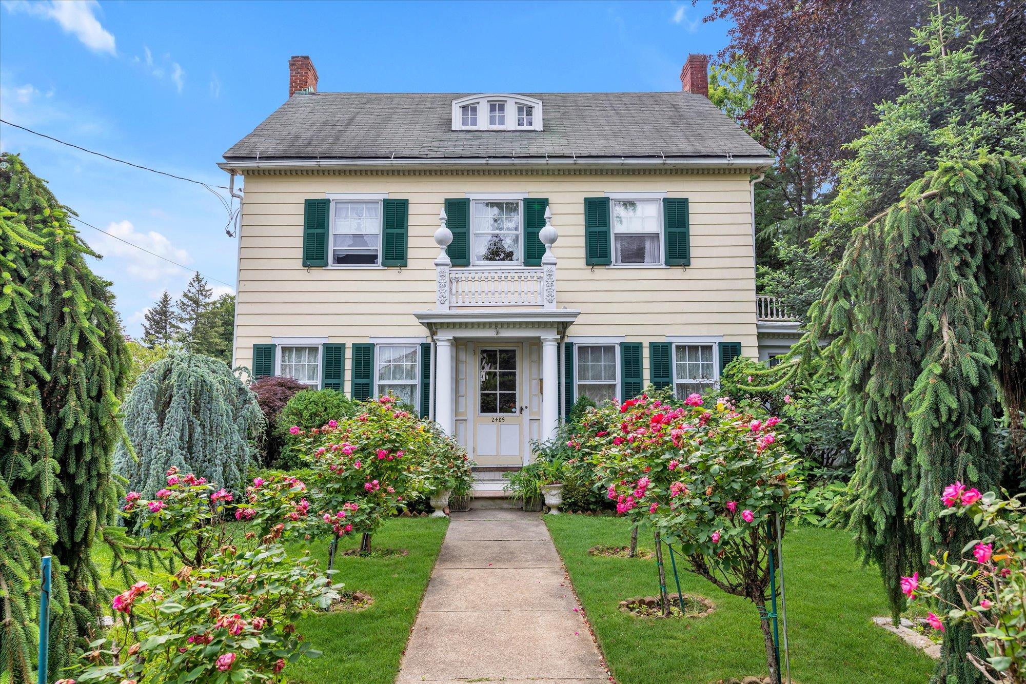 a house view with a garden space