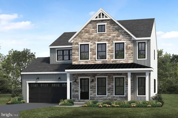 a front view of a house with yard