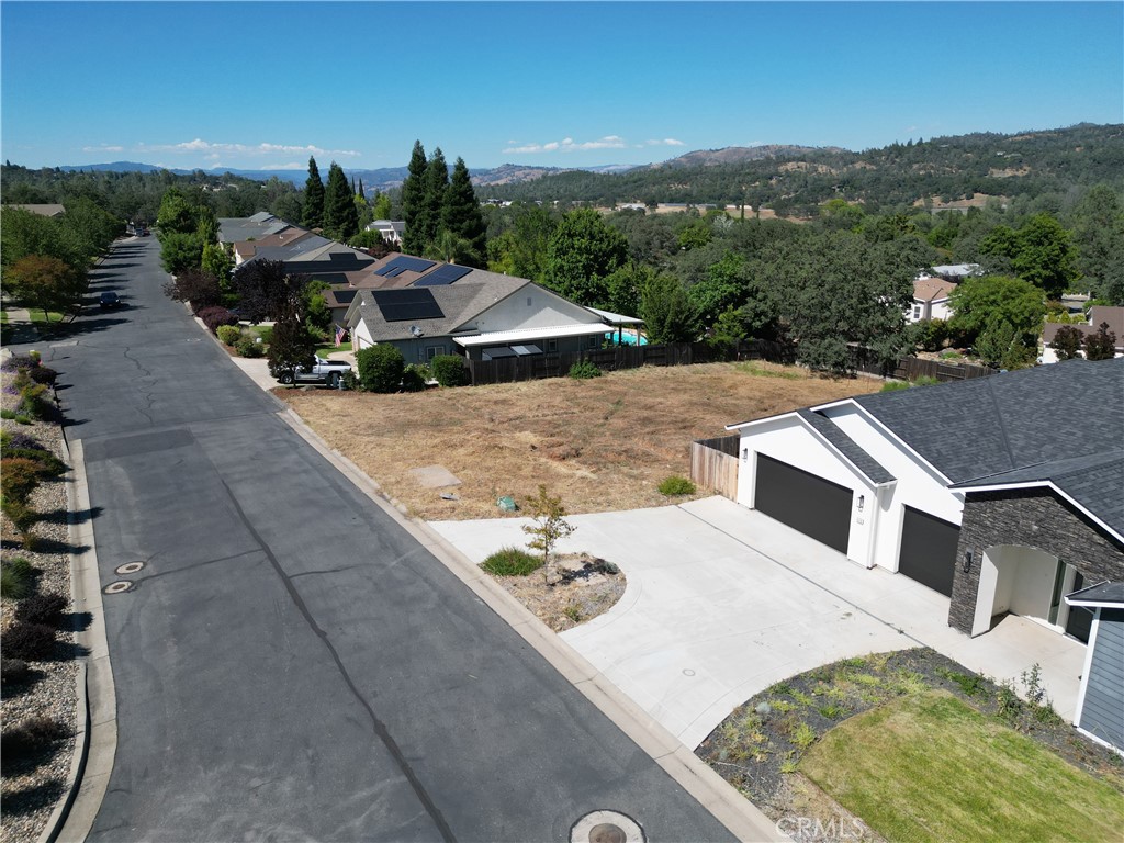 205 Lariat Loop Oroville, CA 95966 - Photo 5 of 8 an aerial view of a house with a yard