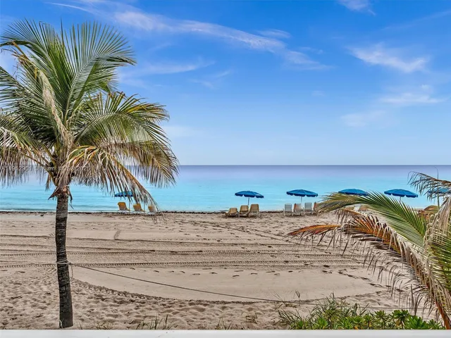 a view of a city with tall buildings