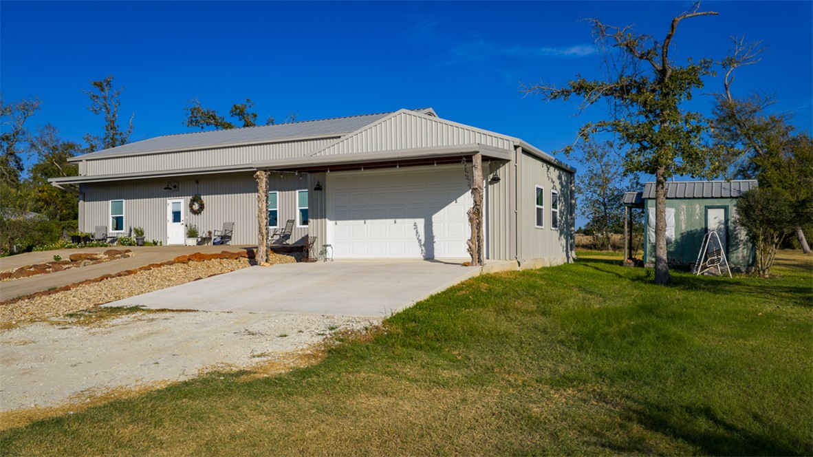 11258 Providence Road Hearne, TX 77859 - Photo 10 of 39 a front view of a house with a yard