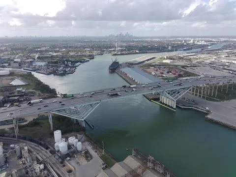 an aerial view of a house with a lake view