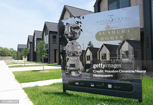 7842 Linda Vista Road Houston, TX 77028 - Photo 7 of 8 a front view of a house with a garden