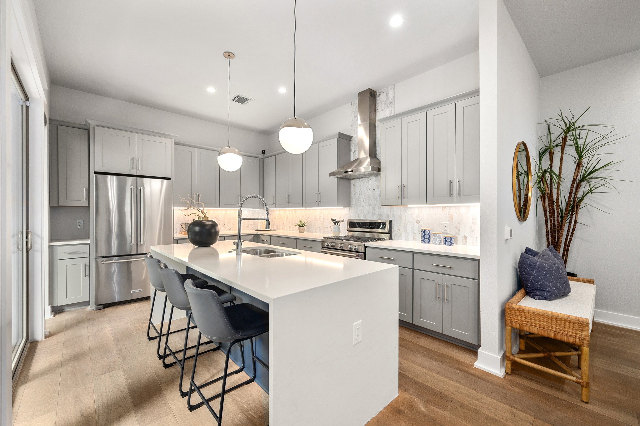 1409 Alegria Road, Unit A Austin, TX 78757 - Photo 7 of 24 Culinary aspirations meet contemporary design in this bright, well-appointed kitchen.