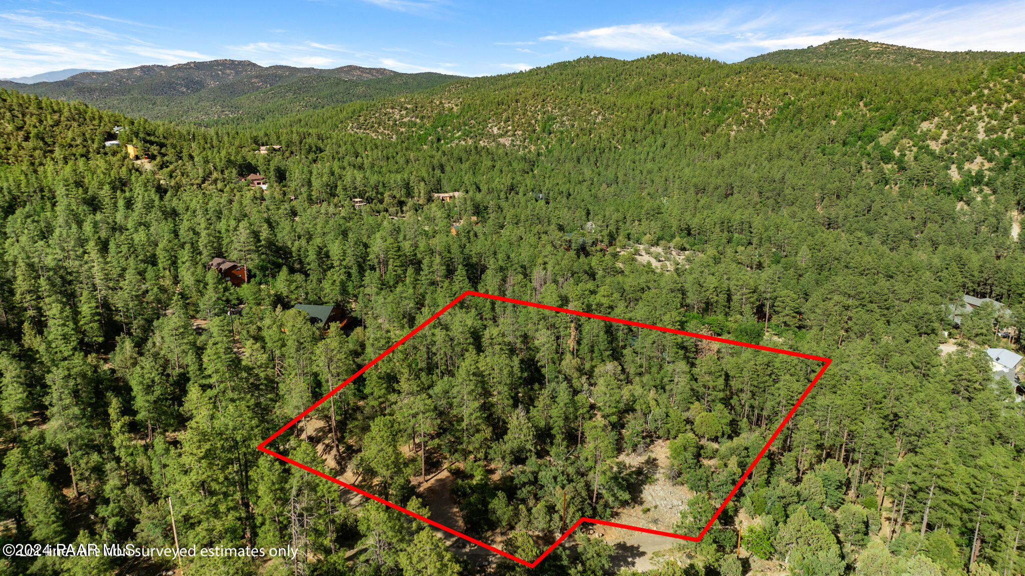0 East Blue Jay Road Prescott, AZ 86303 - Photo 7 of 10 a view of a lush green forest with mountains in the background