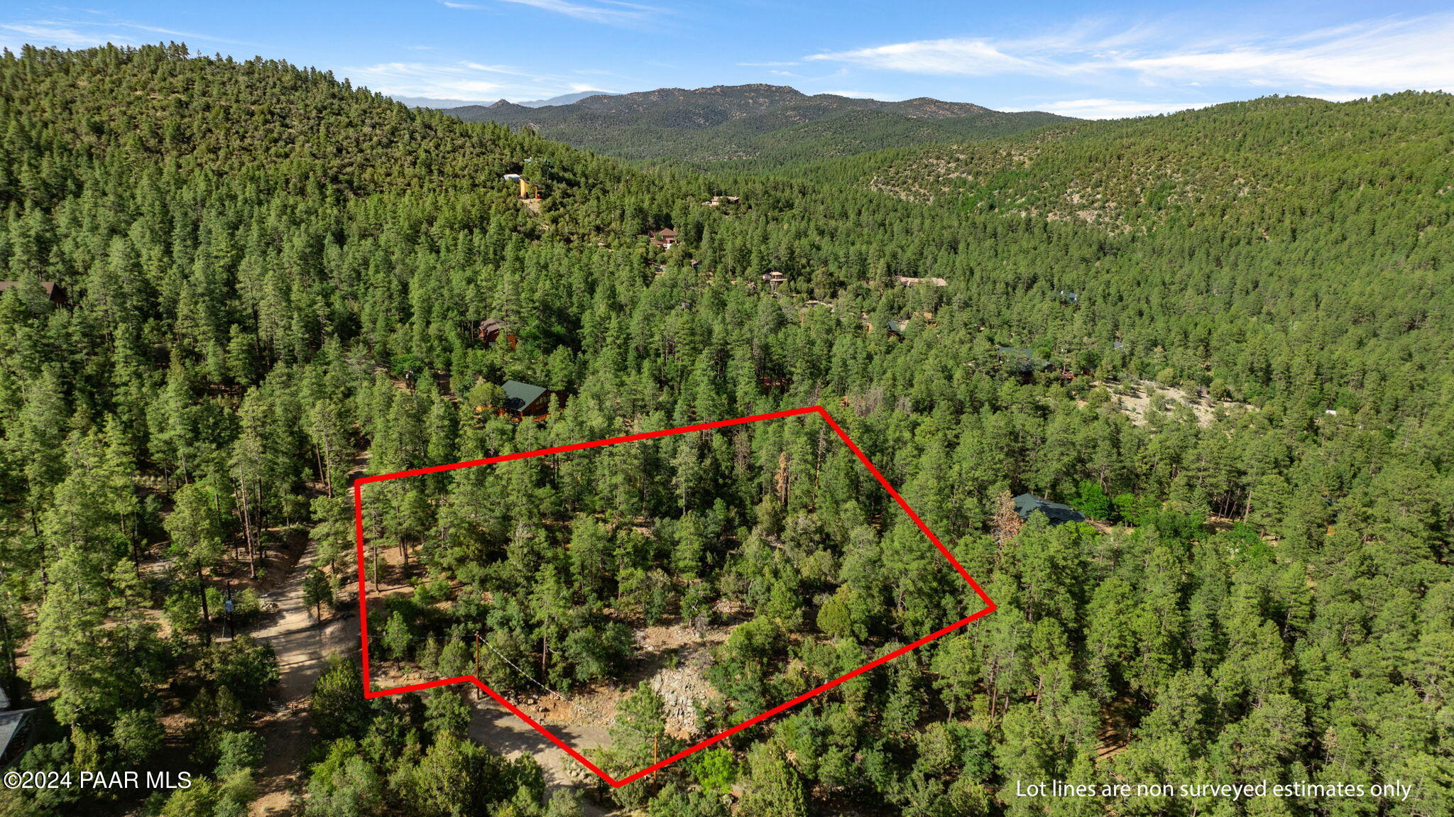 0 East Blue Jay Road Prescott, AZ 86303 - Photo 8 of 10 a view of a lush green forest with mountains in the background