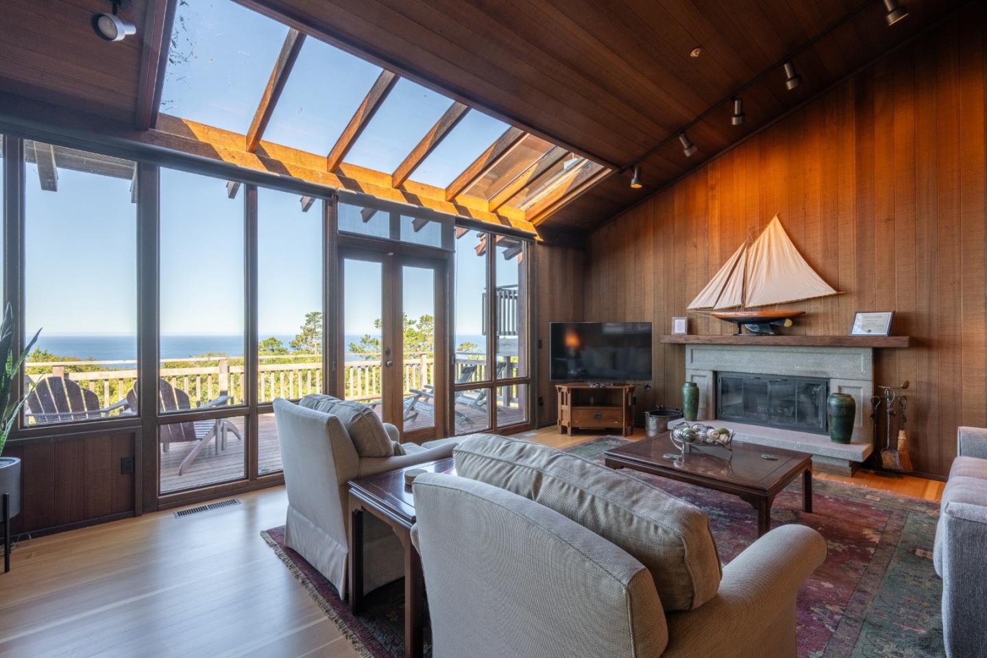 214 Crest Road Carmel, CA 93923 - Photo 7 of 29 a living room with furniture and a fireplace