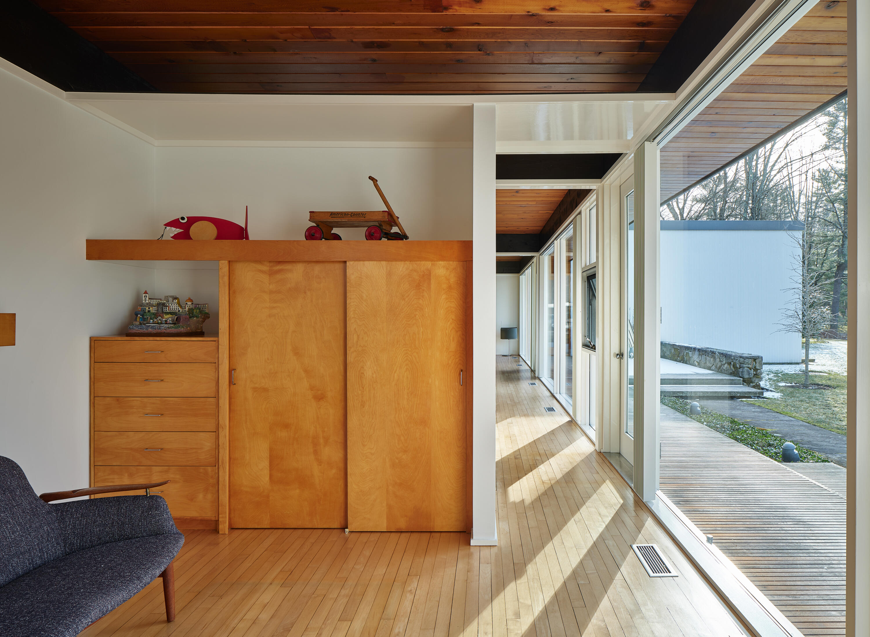 431 Valley Road New Canaan, CT 06840 - Photo 11 of 32 a view of a hallway with wooden floor and staircase