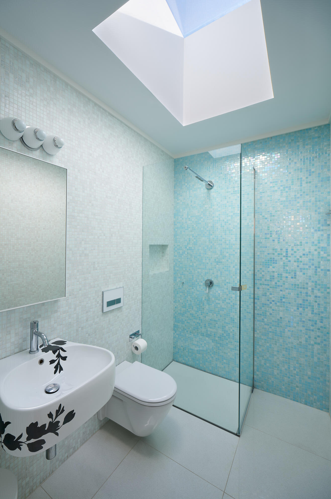 431 Valley Road New Canaan, CT 06840 - Photo 12 of 32 a bathroom with a sink a toilet and shower