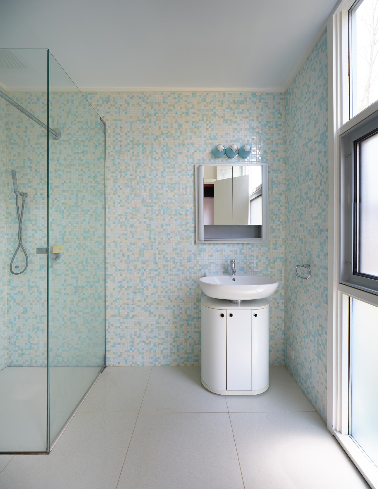 431 Valley Road New Canaan, CT 06840 - Photo 17 of 32 a bathroom with a sink shower and a mirror