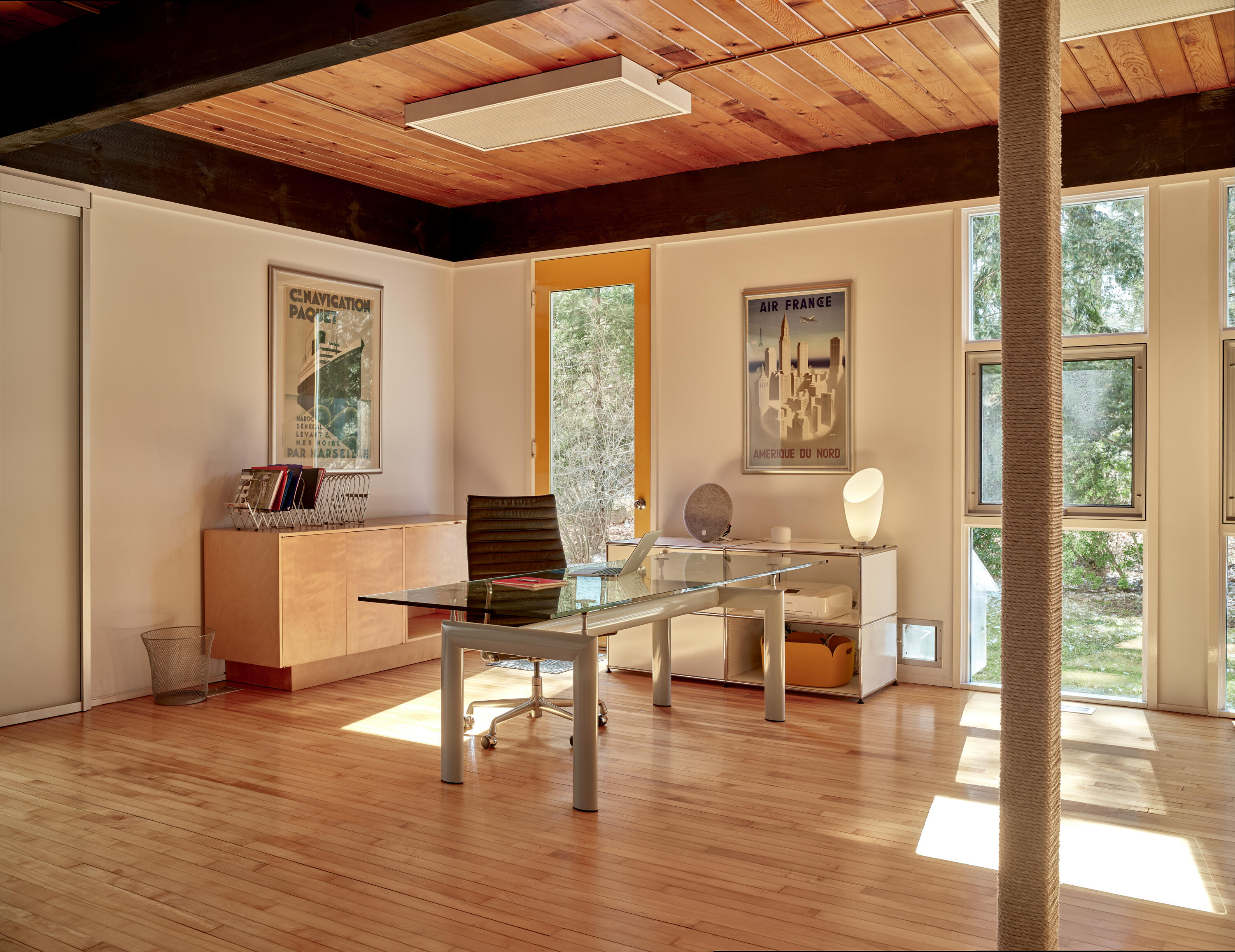 431 Valley Road New Canaan, CT 06840 - Photo 18 of 32 a living room with furniture a wooden floor and a table