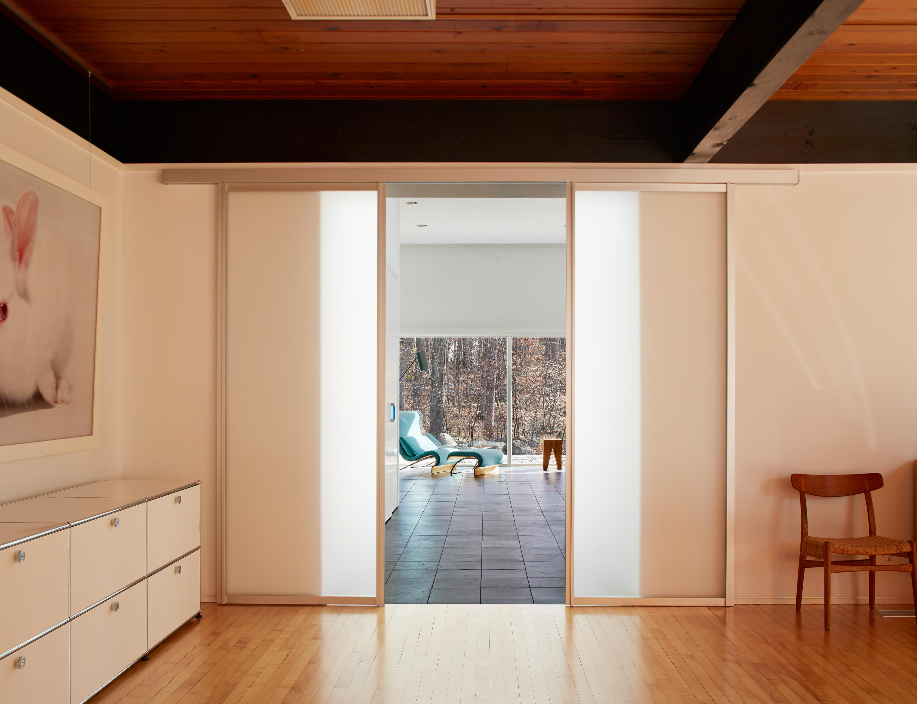 431 Valley Road New Canaan, CT 06840 - Photo 21 of 32 a view of hallway with furniture and wooden floor