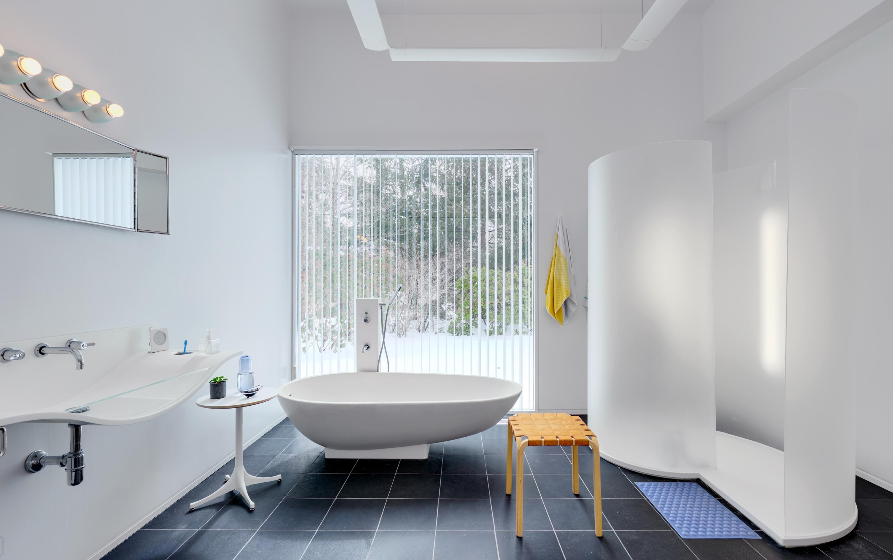 431 Valley Road New Canaan, CT 06840 - Photo 24 of 32 a view of a room with lounge chair and windows