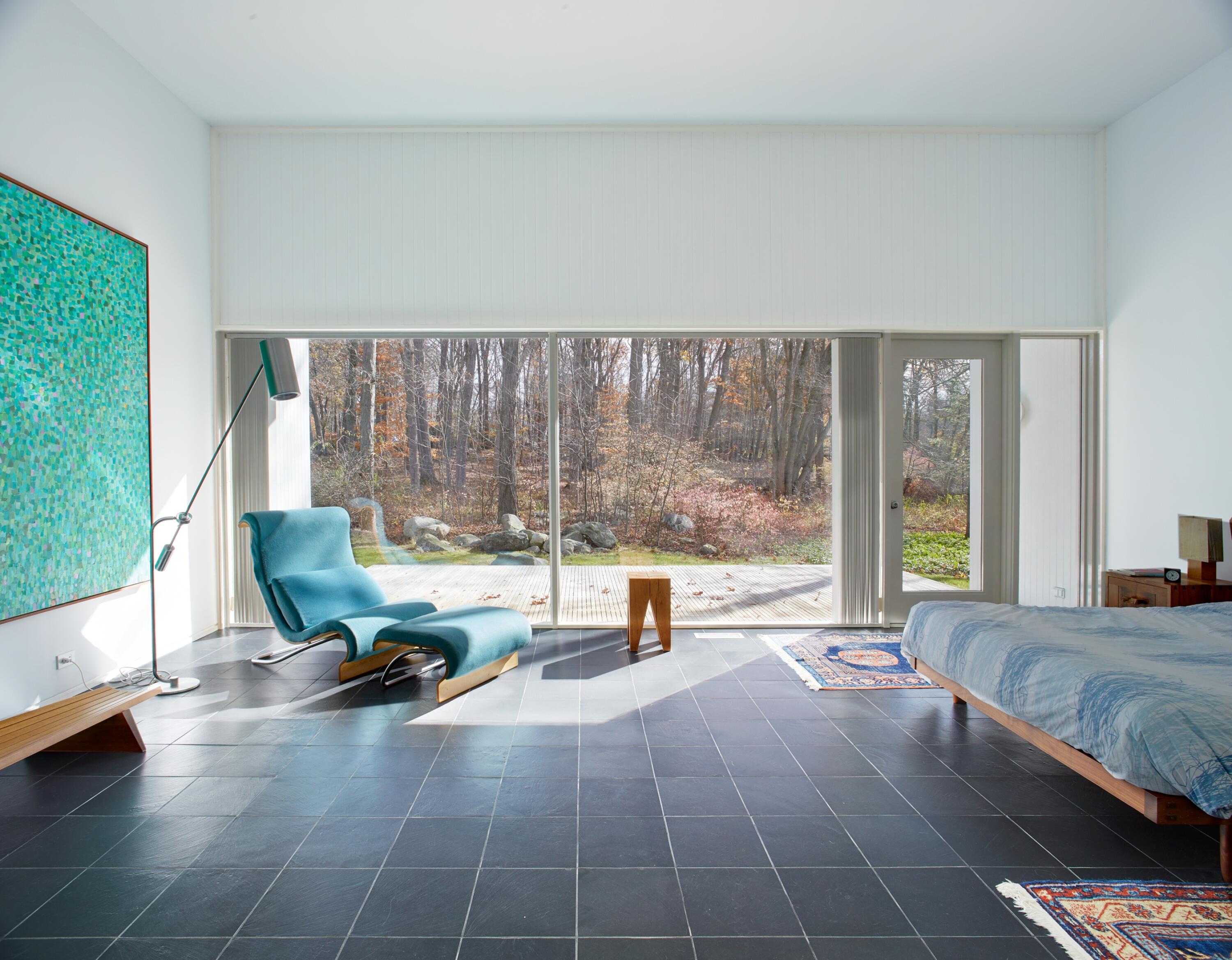 431 Valley Road New Canaan, CT 06840 - Photo 25 of 32 a living room with furniture and large windows