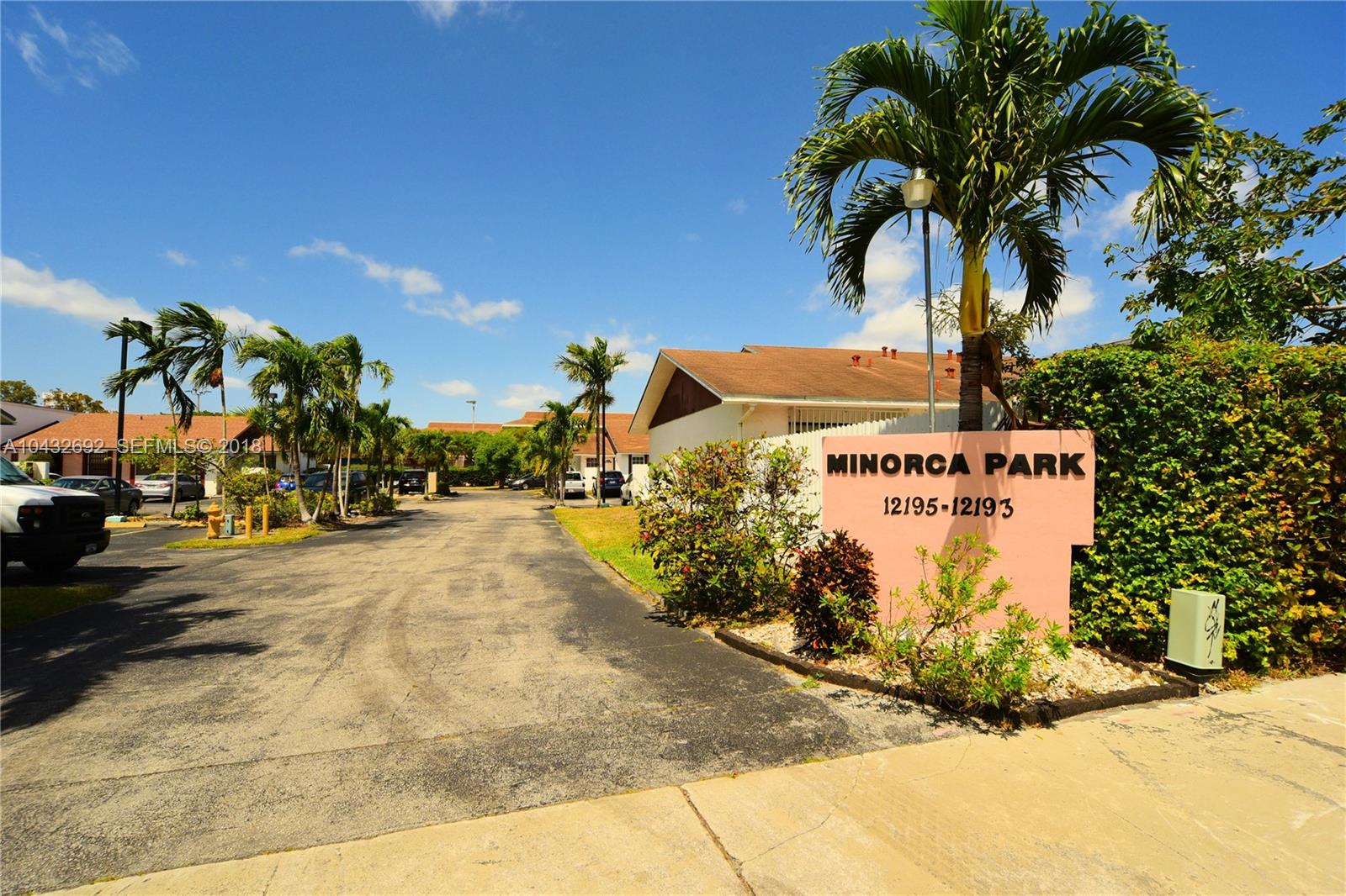 12193 Southwest 10th Street, Unit 1 Miami, FL 33184 - Photo 2 of 16 a view of outdoor space with palm trees
