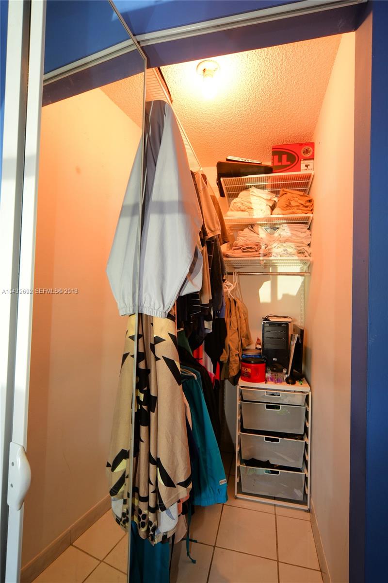 12193 Southwest 10th Street, Unit 1 Miami, FL 33184 - Photo 10 of 16 a room with storage and utility