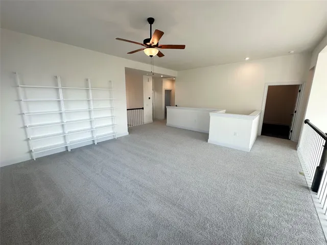 a view of workspace and bedroom