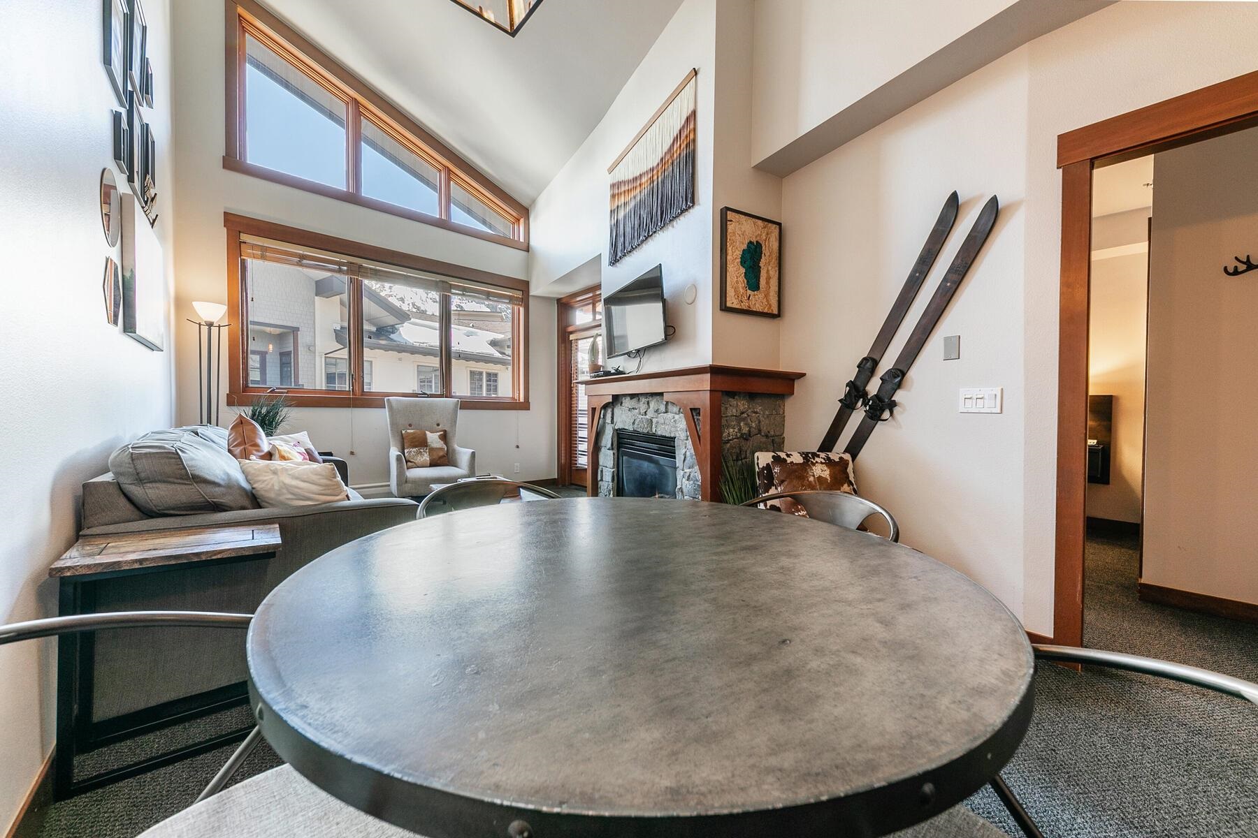 1750 Village East Road, Unit 5418 Olympic Valley, CA 96146 - Photo 12 of 21 a view of a livingroom with furniture staircase and a kitchen