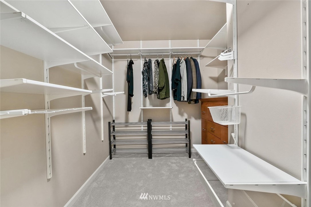 19622 94th Avenue Northeast, Unit 38 Bothell, WA 98011 - Photo 13 of 30 a view of walk in closet with clothes and shoes