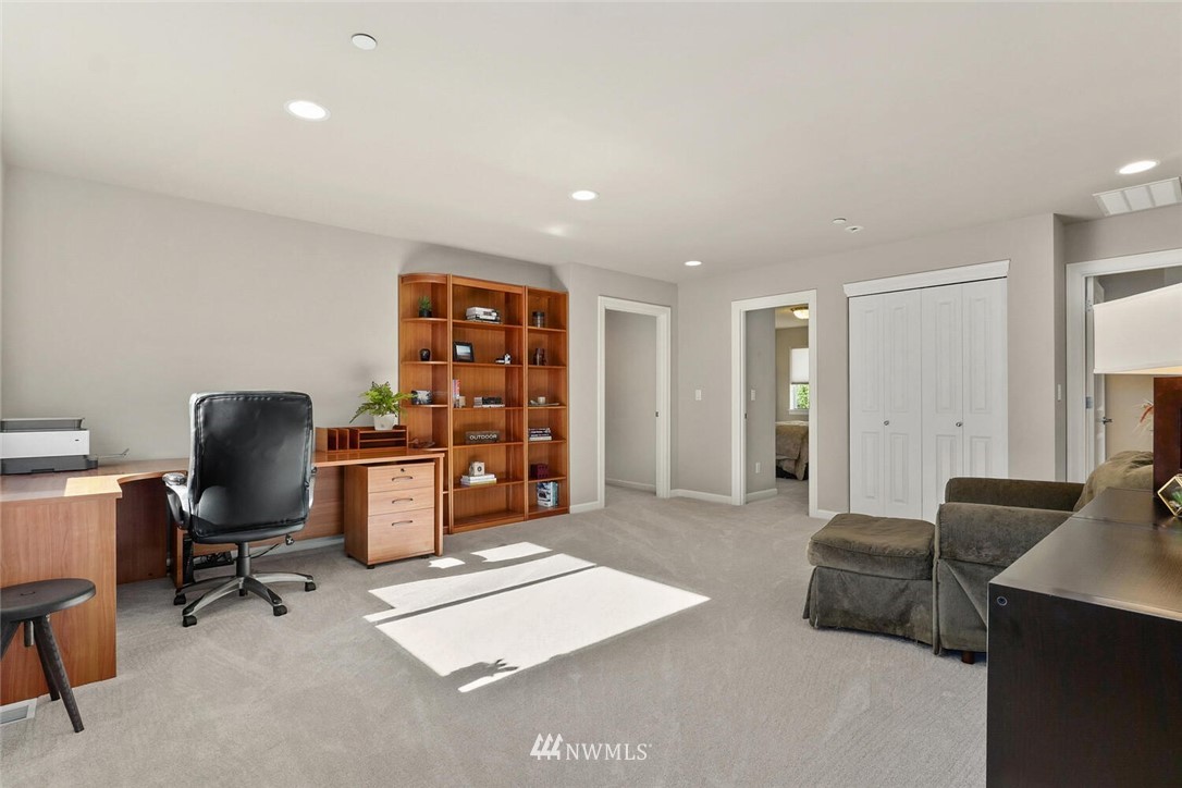 19622 94th Avenue Northeast, Unit 38 Bothell, WA 98011 - Photo 14 of 30 a view of workspace with furniture and cabinet