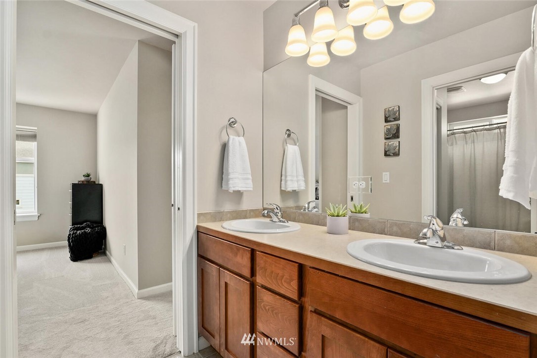19622 94th Avenue Northeast, Unit 38 Bothell, WA 98011 - Photo 17 of 30 a bathroom with a sink double vanity and a mirror