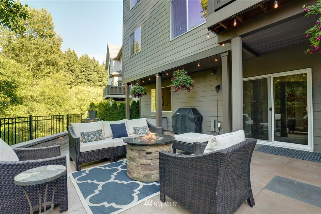 19622 94th Avenue Northeast, Unit 38 Bothell, WA 98011 - Photo 20 of 30 a view of a patio on the deck in front of house