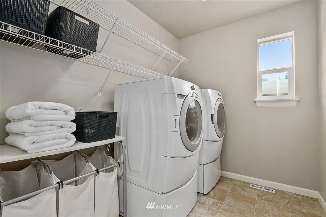 19622 94th Avenue Northeast, Unit 38 Bothell, WA 98011 - Photo 23 of 30 a utility room with dryer and washer