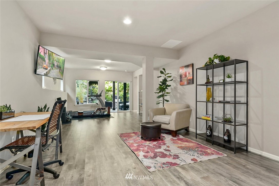 19622 94th Avenue Northeast, Unit 38 Bothell, WA 98011 - Photo 25 of 30 a living room with furniture and a wooden floor