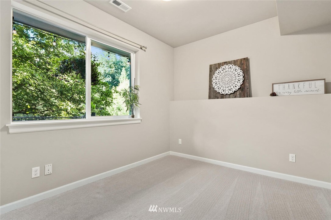 19622 94th Avenue Northeast, Unit 38 Bothell, WA 98011 - Photo 27 of 30 an empty room with a window